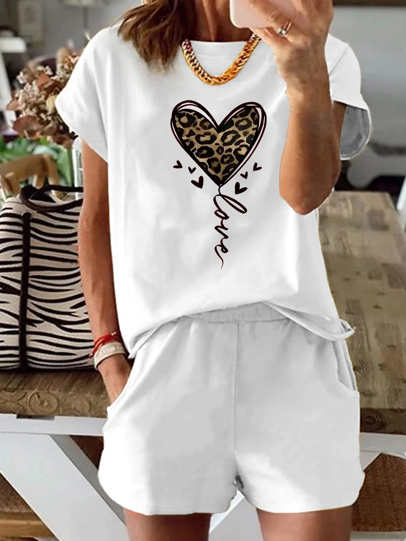 Summer women's fashionable leopard print heart-shaped print casual loose round neck short sleeved T-shirt shorts two-piece set - Image 2