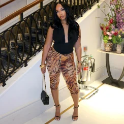 CUTENOVA Women'S Solid Color Hanging Neck Swinging Collar Backless Drawstring Top + Skinny Leopard Print Five Points Pants Set