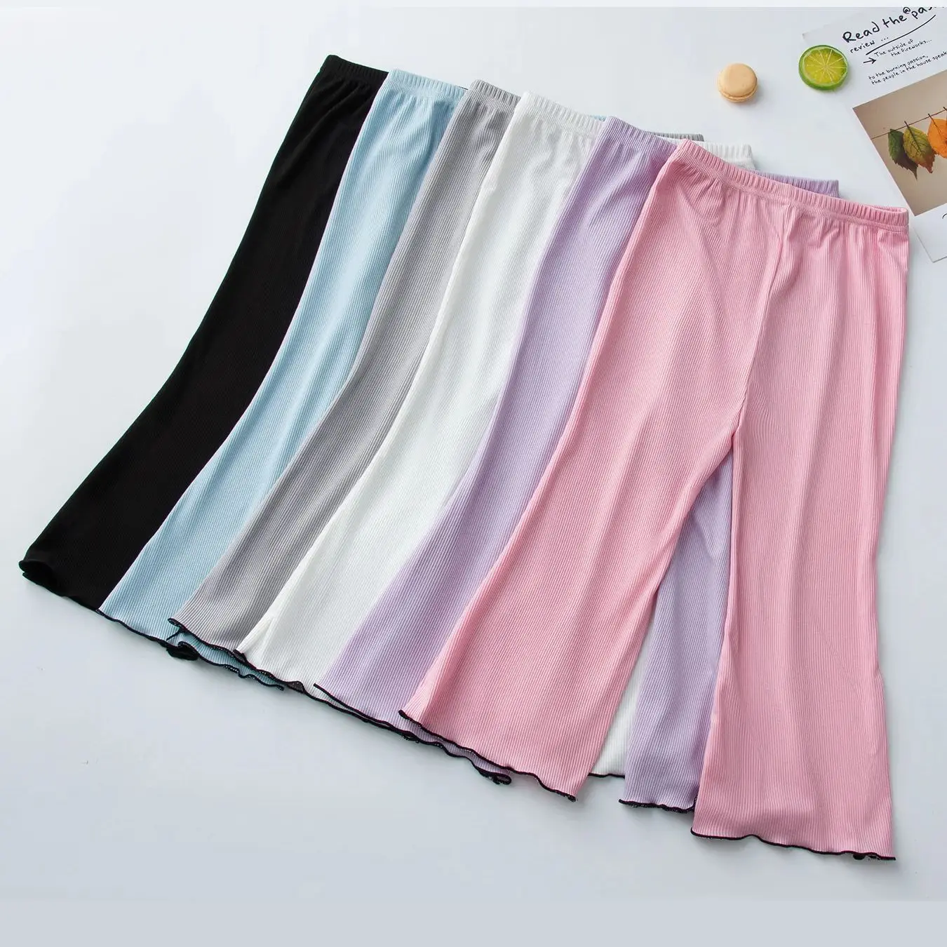 Children's solid color bell bottoms girls summer color casual fashion pants female students elastic waist pants with wavy sides. - Image 3