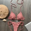 Solid color hollow fabric bikini sexy women's split triangle swimsuit braided strap bikini