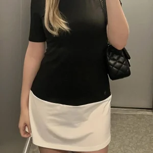 2025 Turtleneck Half Sleeve Mini Dresses French Style Fashion Elegant Black And White Patchwork Bodycon Dress