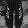 Symmetric gothic spike patterns decorate men's hip hop joggers, drawstring waist brings comfy loose fit for dark street sports