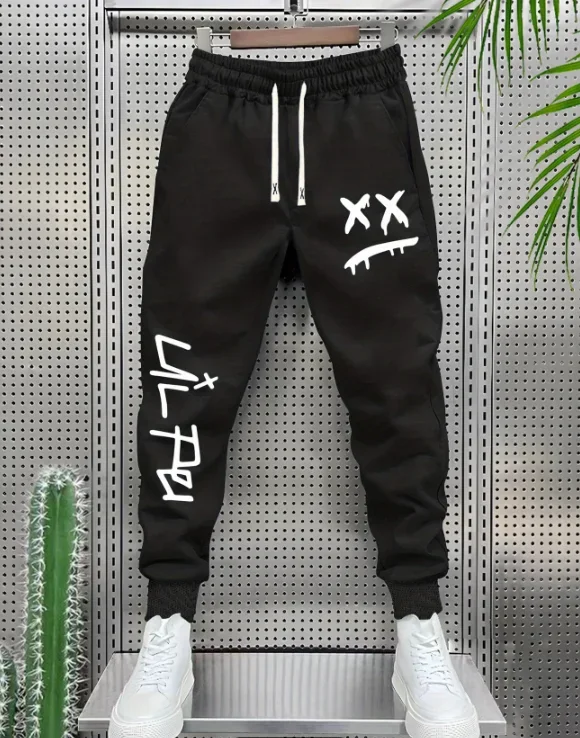 XX Eyes Smiley Sweatpants, Unisex Drawstring Joggers Dripping Face Graffiti Print Cuffed Side Pocket Streetwear Trousers